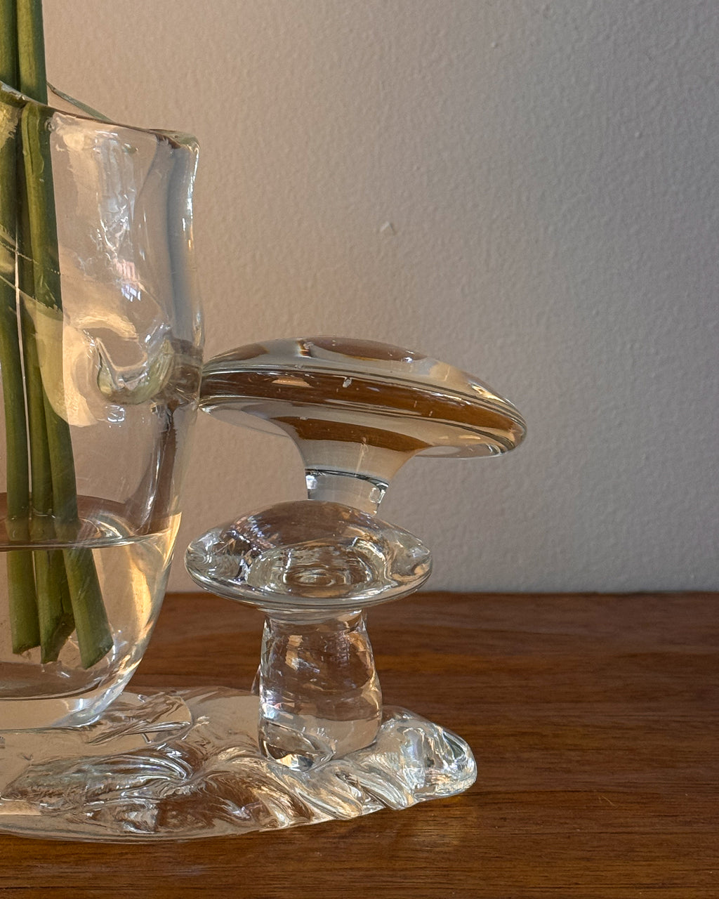 Clear art glass handblown vase with mushrooms