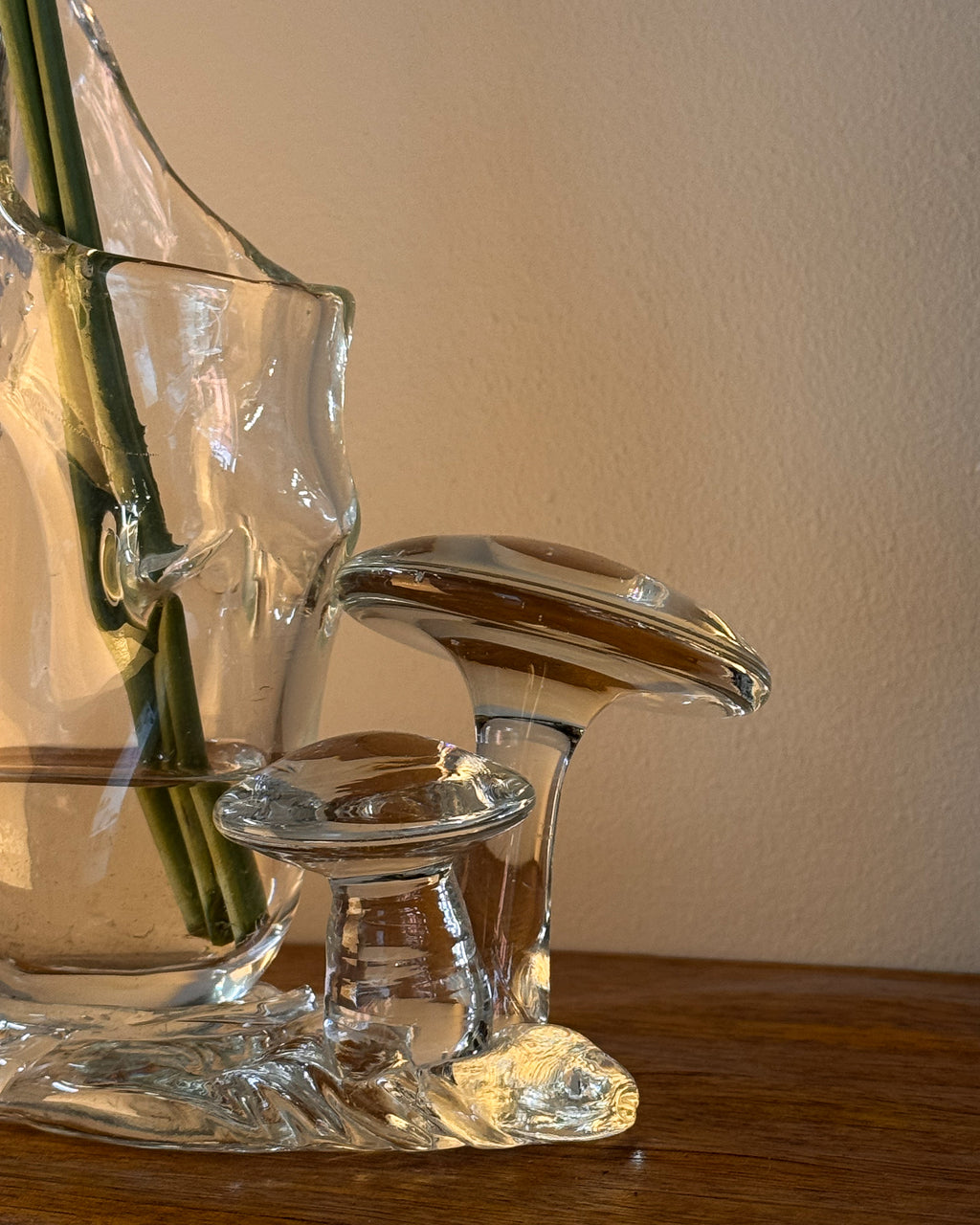 Clear art glass handblown vase with mushrooms