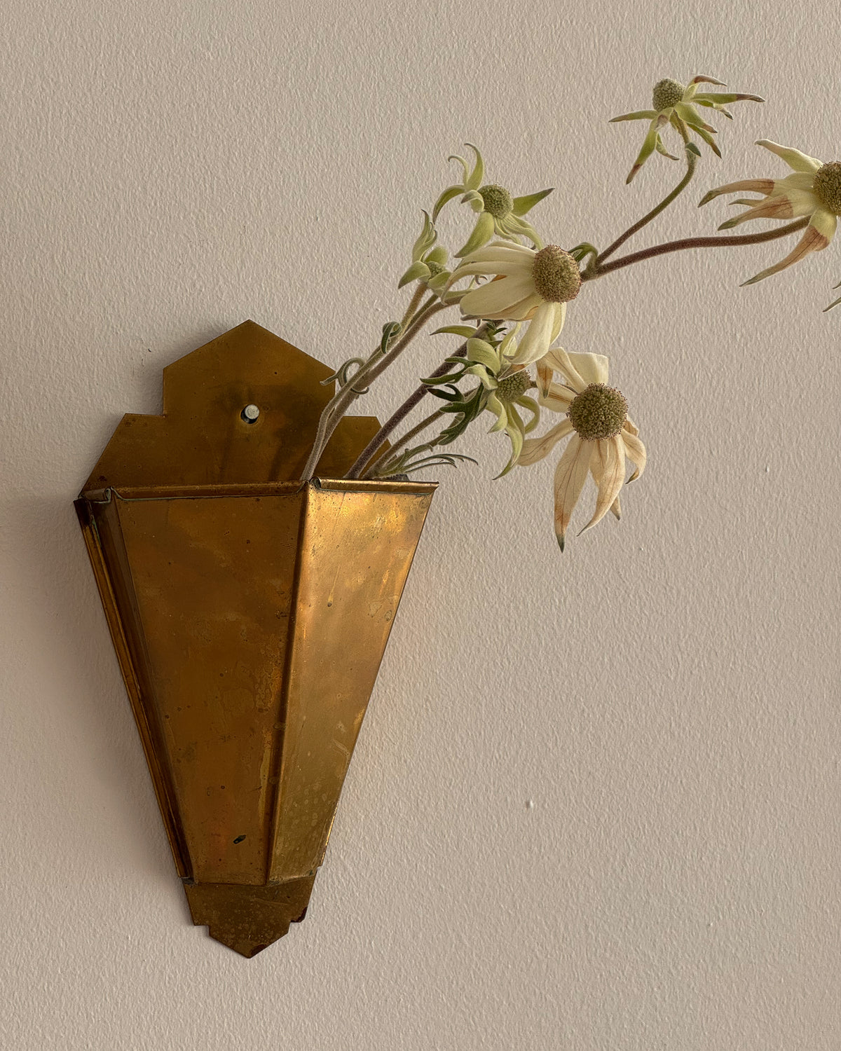 Pair of art deco style brass wall vases