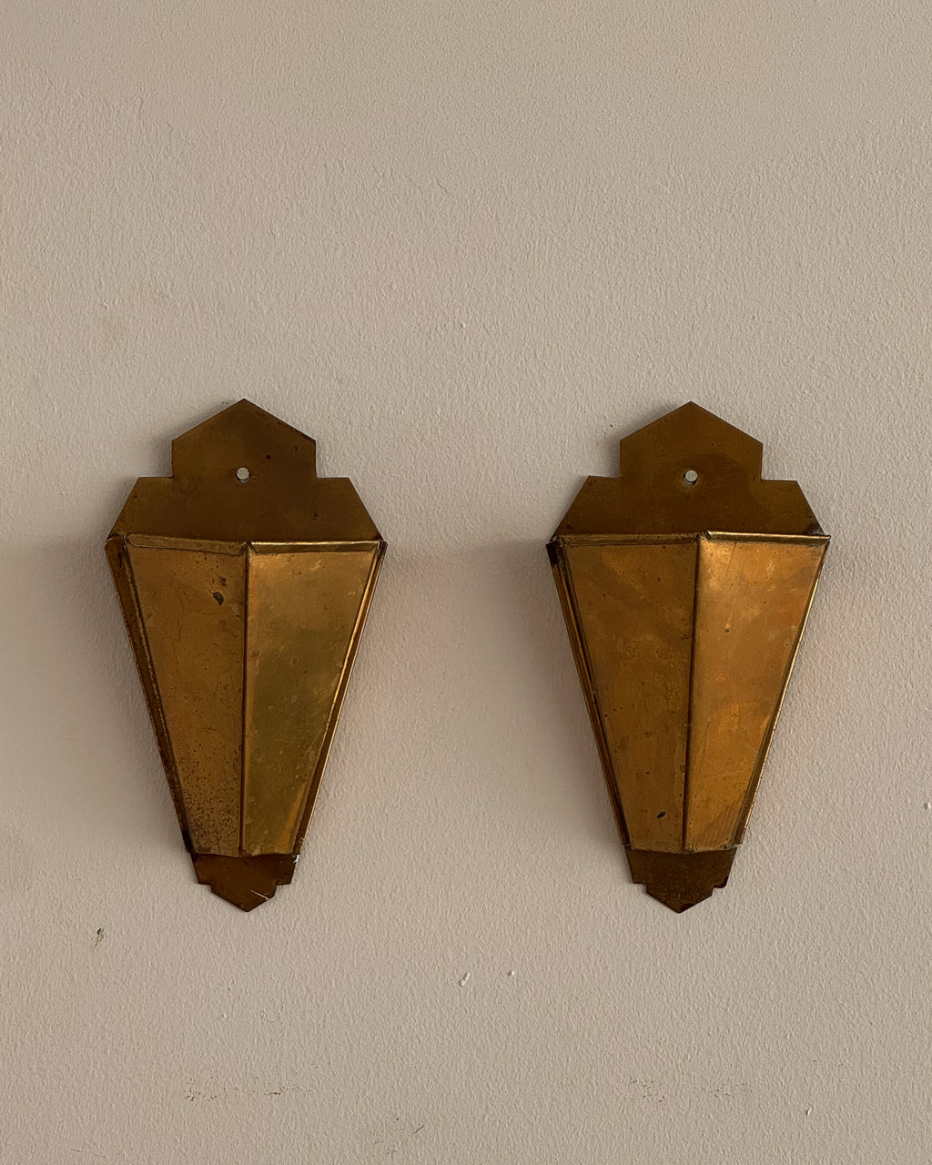 Pair of art deco style brass wall vases
