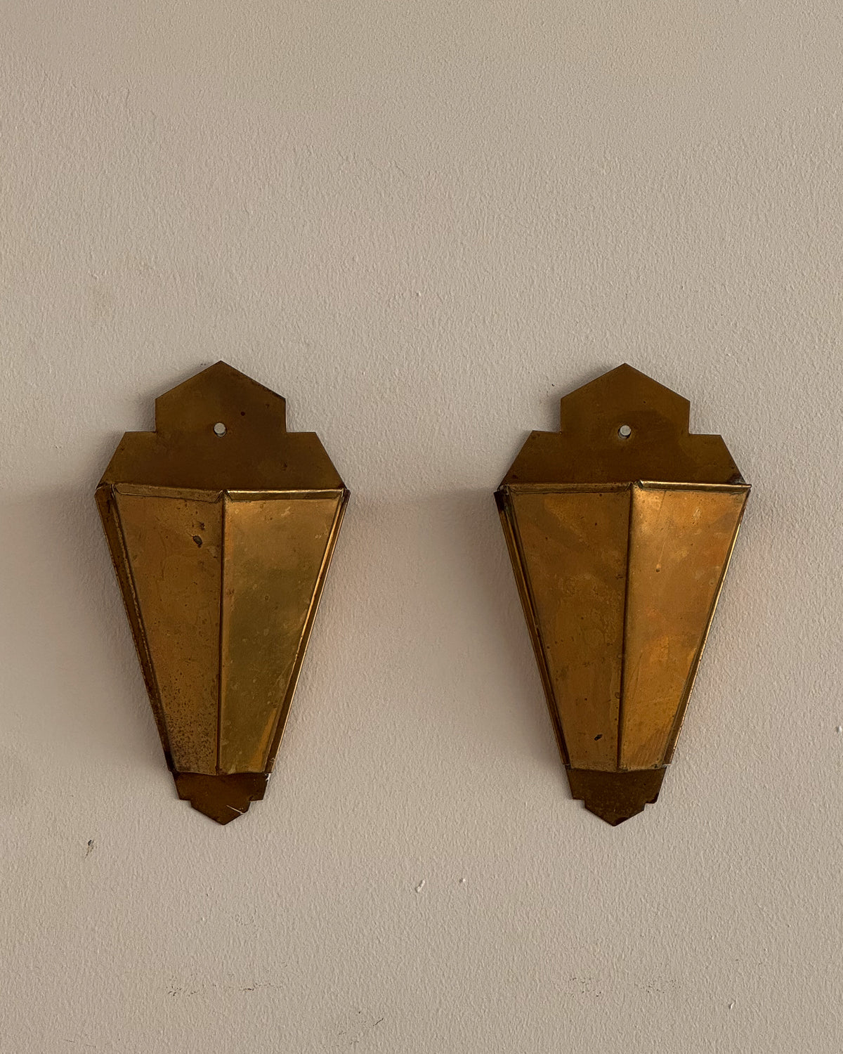 Pair of art deco style brass wall vases