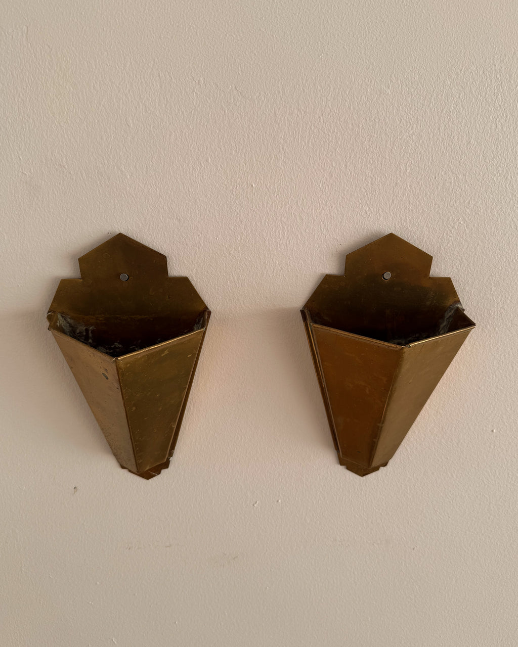 Pair of art deco style brass wall vases