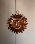 Copper sun wall hanging