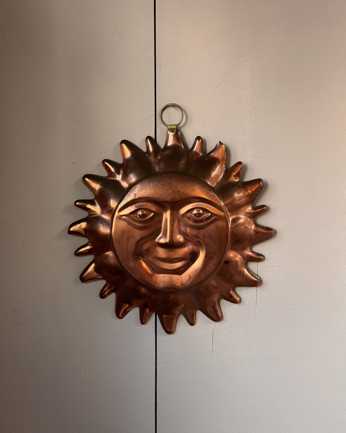 Copper sun wall hanging