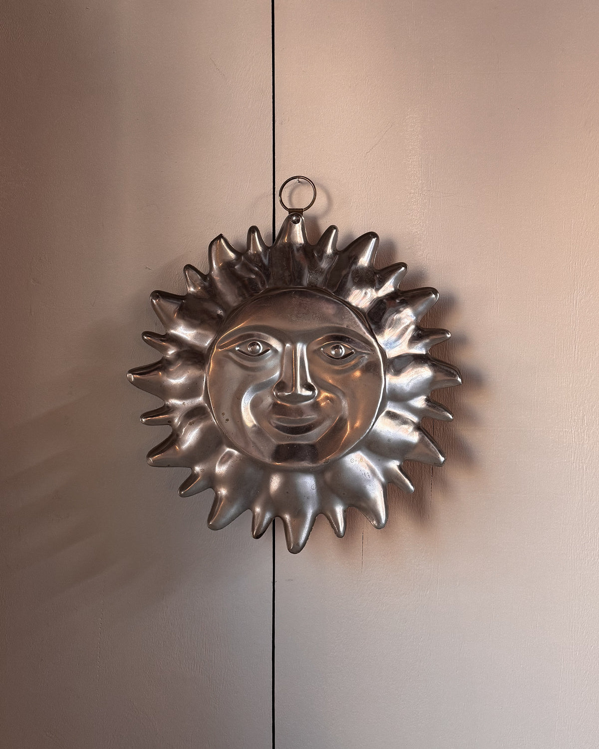 Copper sun wall hanging