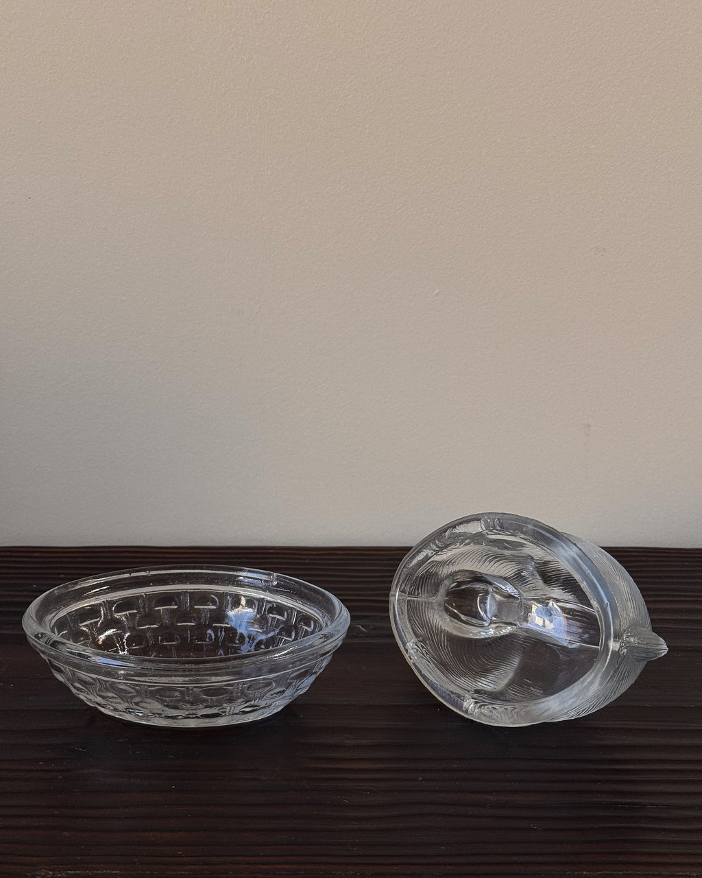Clear glass bunny in a woven basket dish with lid