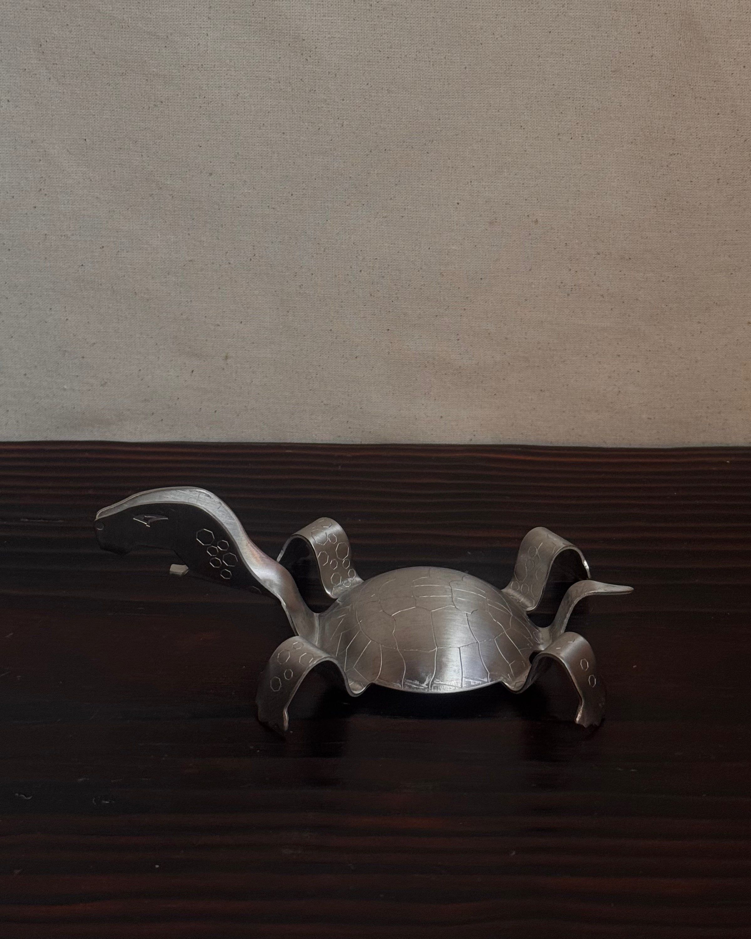 Stainless steel tortoise bottle opener/beer layerer