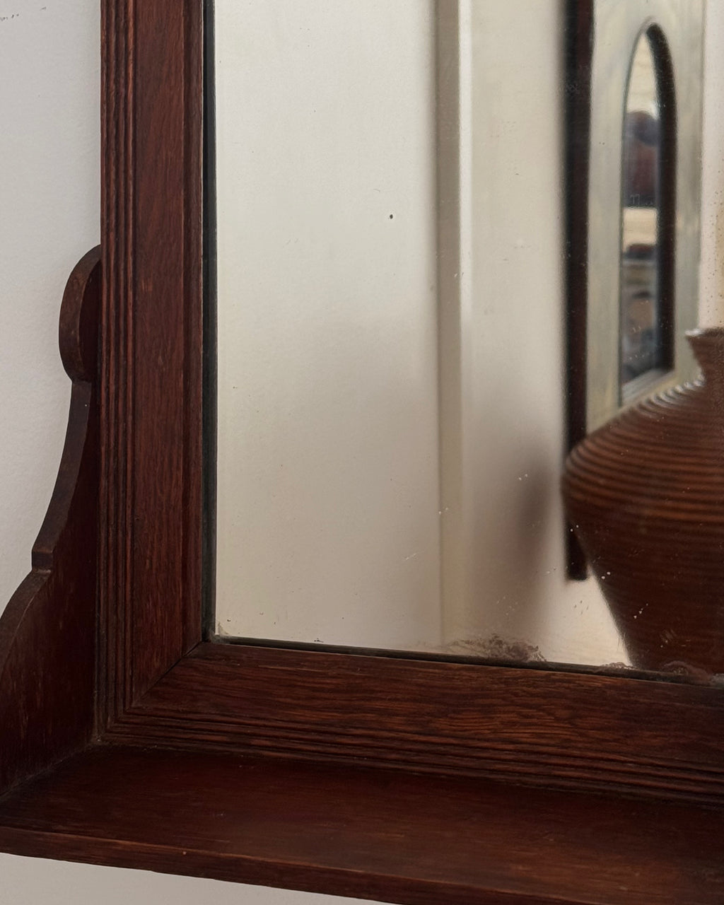 Dark wooden vanity or wall hanging mirror with ledge