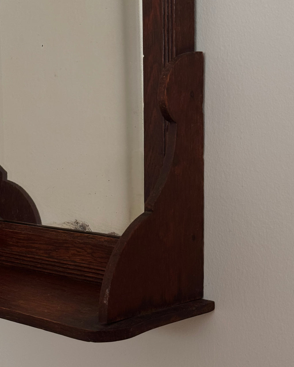 Dark wooden vanity or wall hanging mirror with ledge