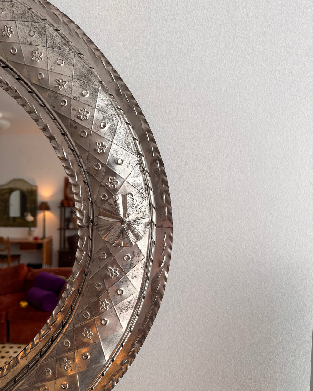 Mexican folk art punched tin oval mirror