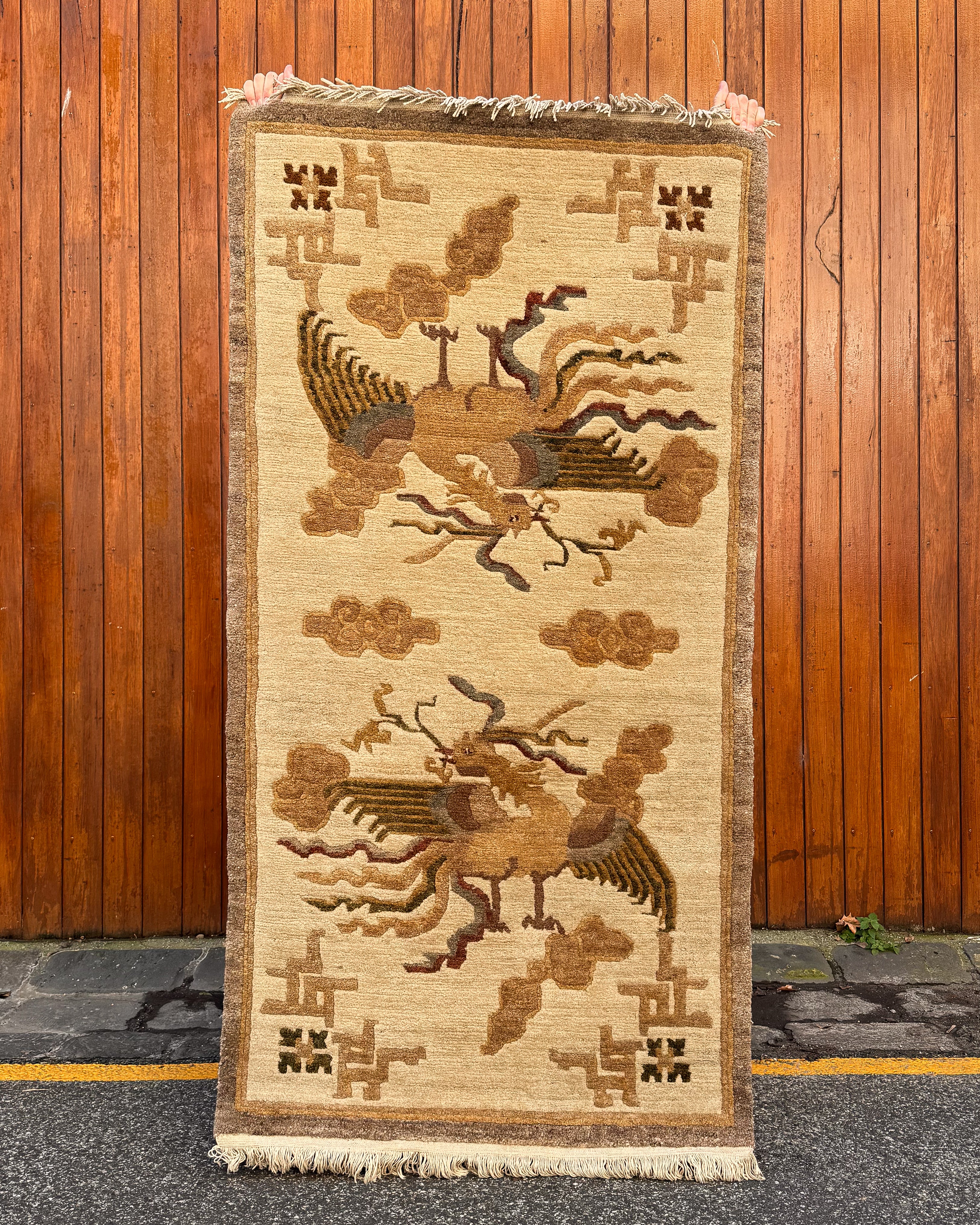 20th century tibetan 100% wool rug depicting two phoenix in the clouds