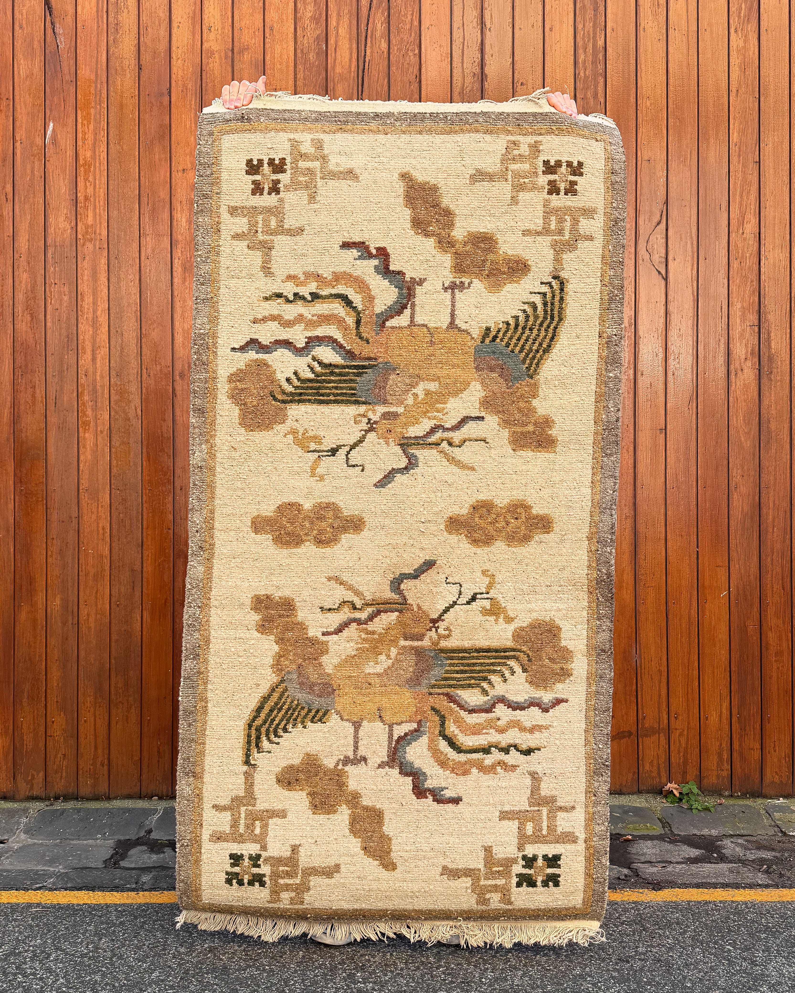 20th century tibetan 100% wool rug depicting two phoenix in the clouds