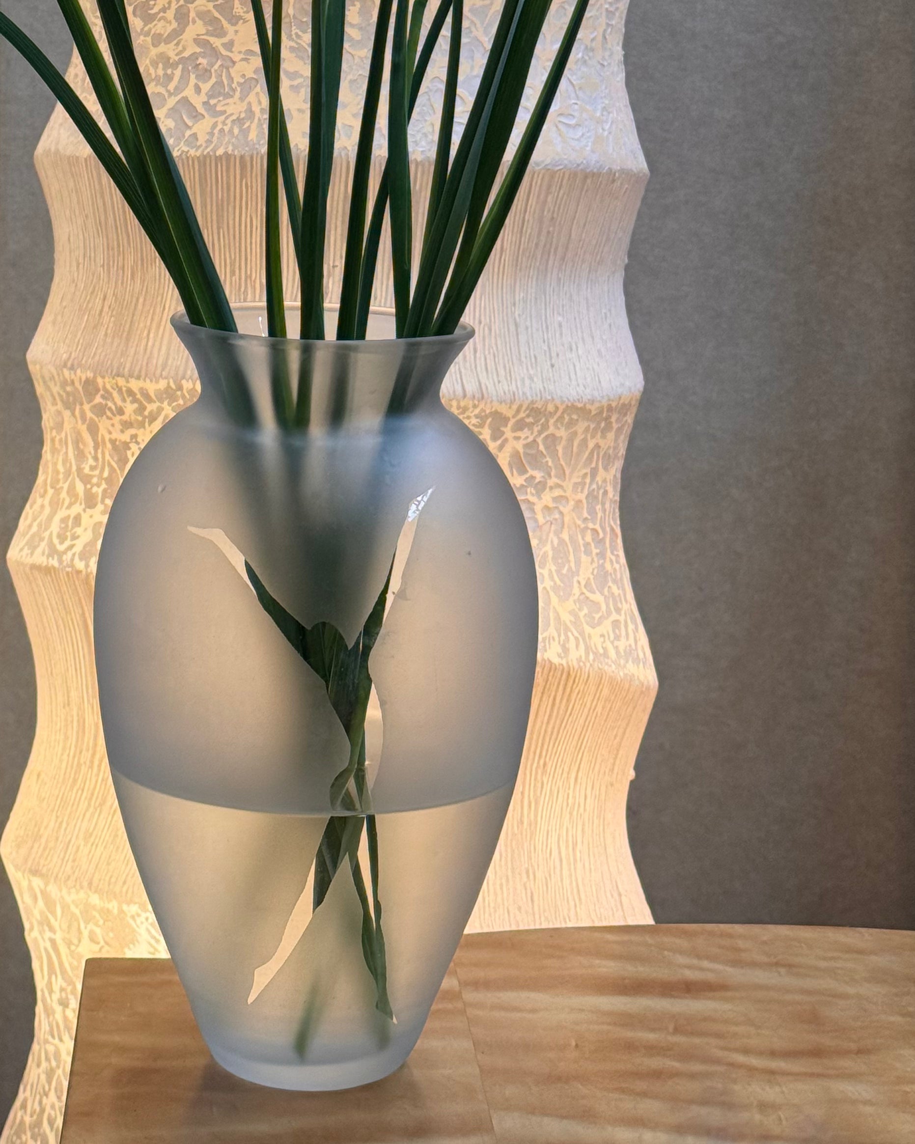 Translucent vase with human figure