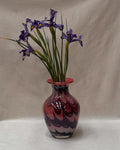 1960s pink art glass vase with black and yellow details