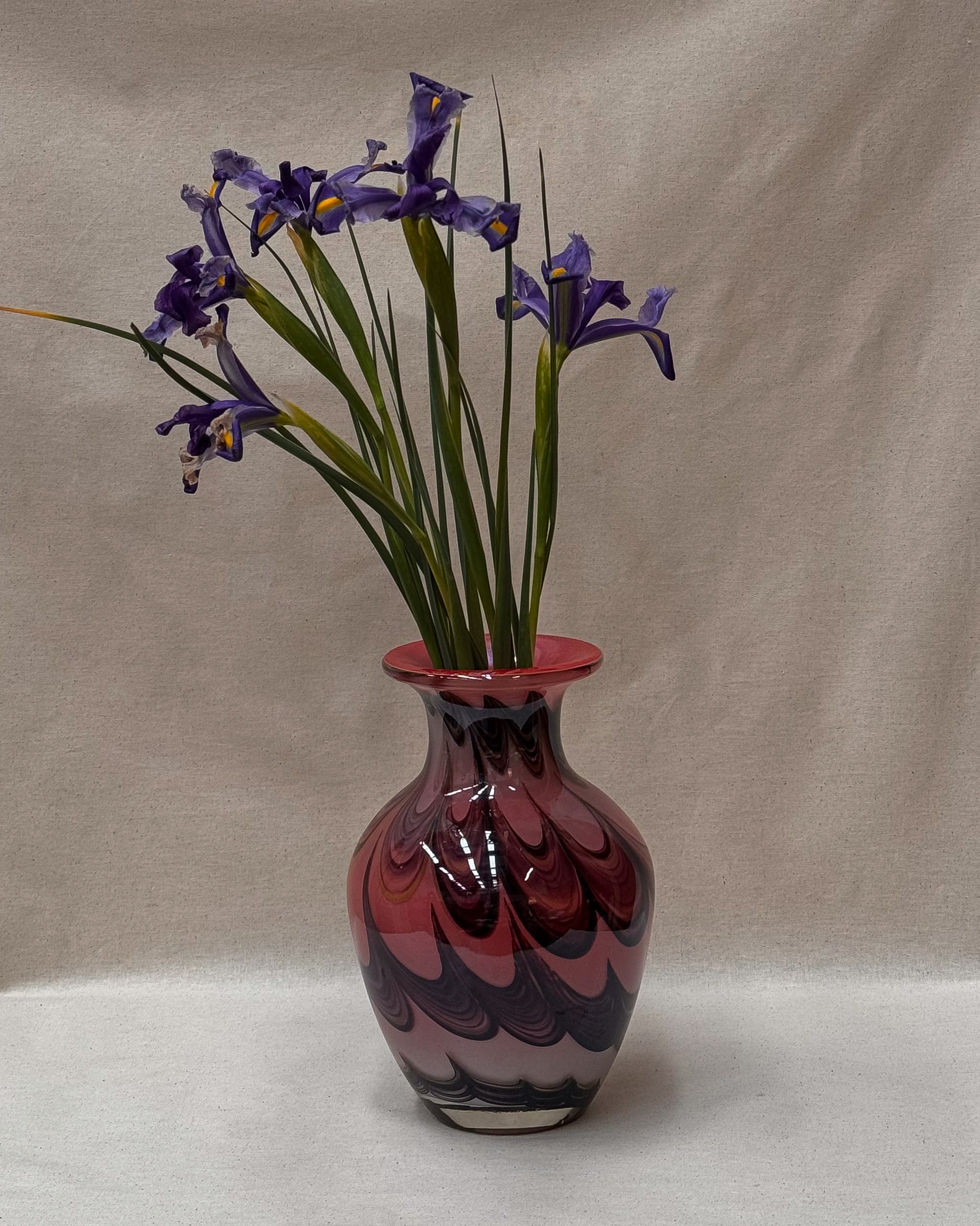 1960s pink art glass vase with black and yellow details