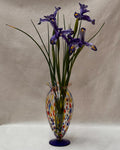Art glass vase with colourful marks and blue base