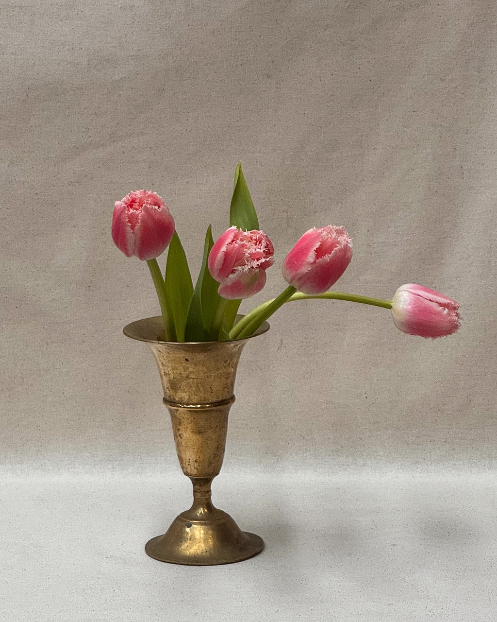 Brass tapered vase with round tapered base