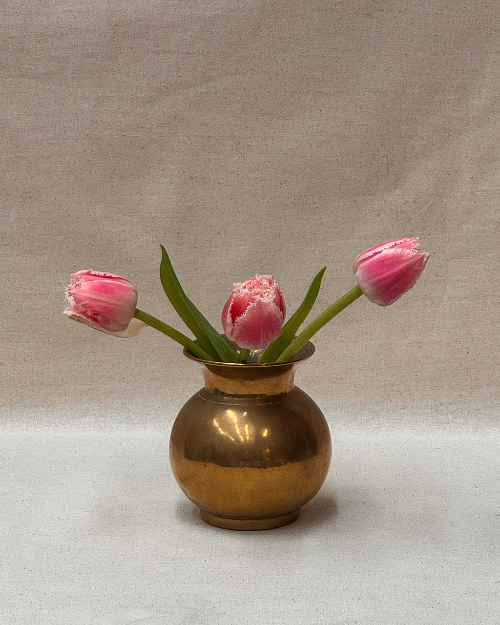 Short rounded solid brass vase