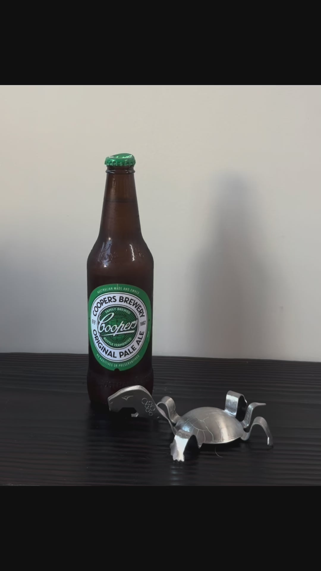 Stainless steel tortoise bottle opener/beer layerer